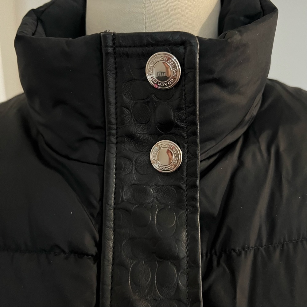 Coach Puffer Coat with Leather Logo Trim.